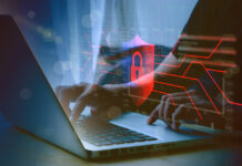 Person’s hands typing on a laptop overlaid with a cybersecurity design.