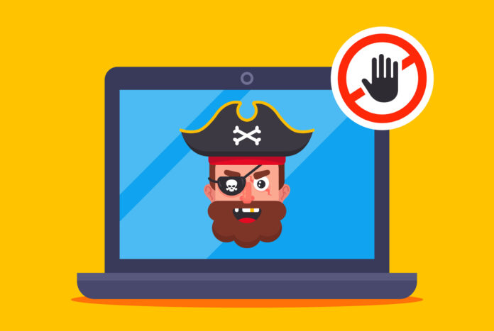 use pirated content on a laptop Illustration of a pirate on a laptop screen depicting digital piracy